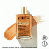 روغن مرطوب کننده و شاین صورت و بدن و مو بیوکسین Bioxin مدل Gold On Skin حجم 100 میل